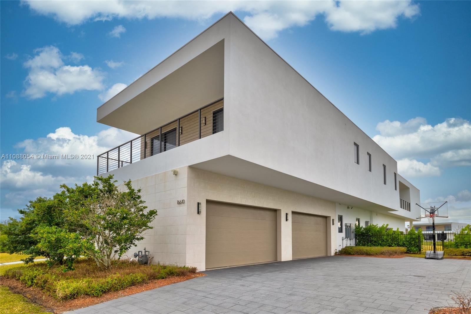 16610 Sunset Way Weston, FL 33326 - Photo 2 of 35 a view of a house with a yard