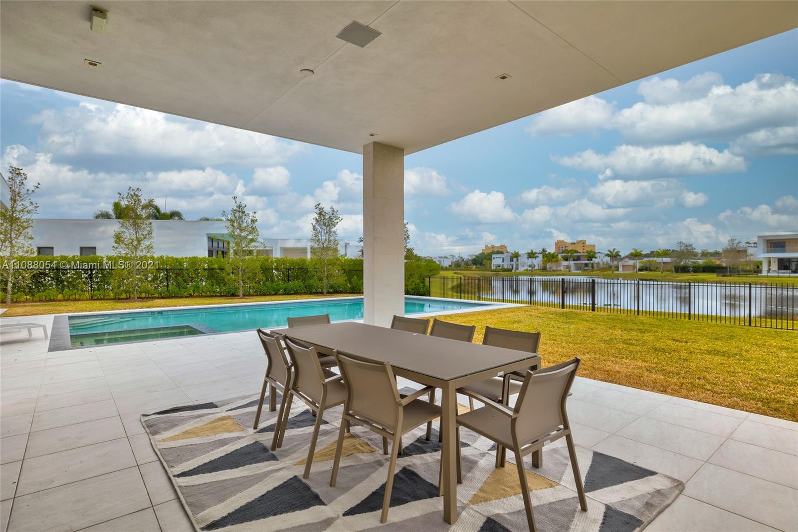 16610 Sunset Way Weston, FL 33326 - Photo 3 of 35 a view of a terrace with furniture and city view
