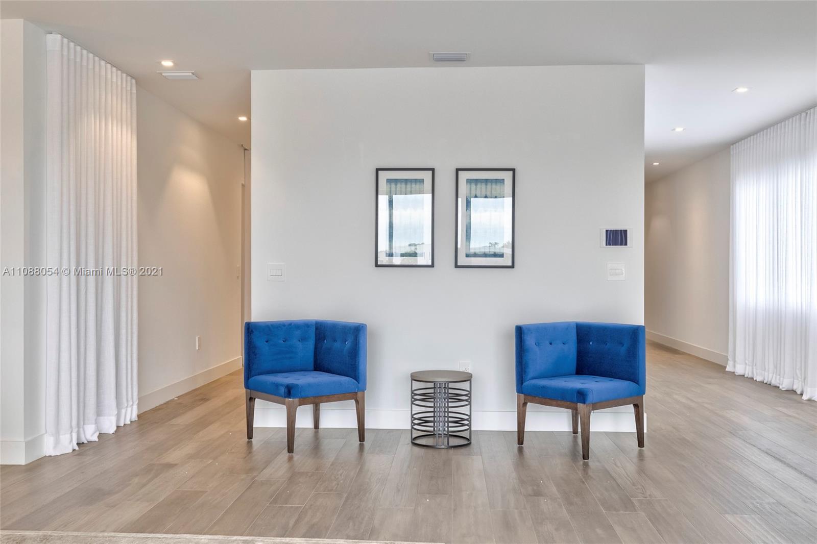 16610 Sunset Way Weston, FL 33326 - Photo 31 of 35 a room with furniture and a window