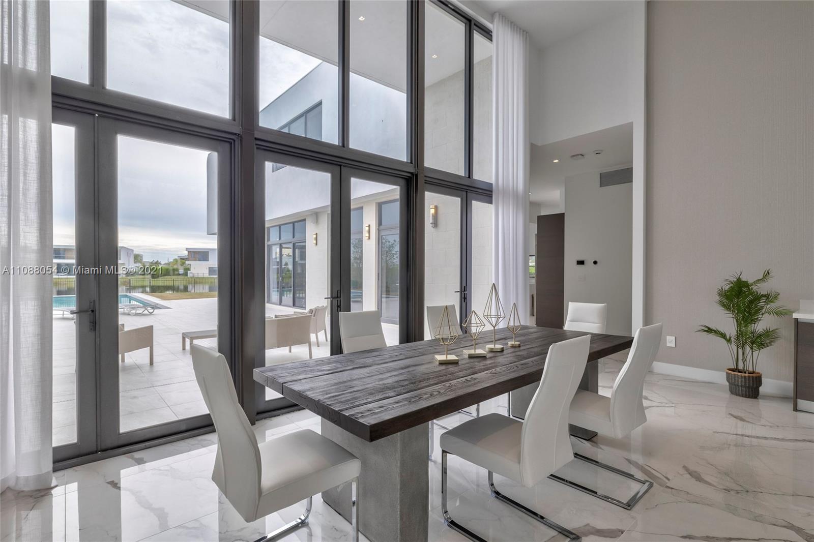 16610 Sunset Way Weston, FL 33326 - Photo 7 of 35 a view of a dining room with furniture and window