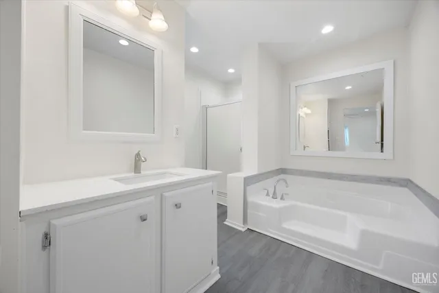 a white bath tub sitting in a bathroom