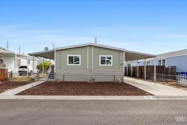 a front view of a house with a garage