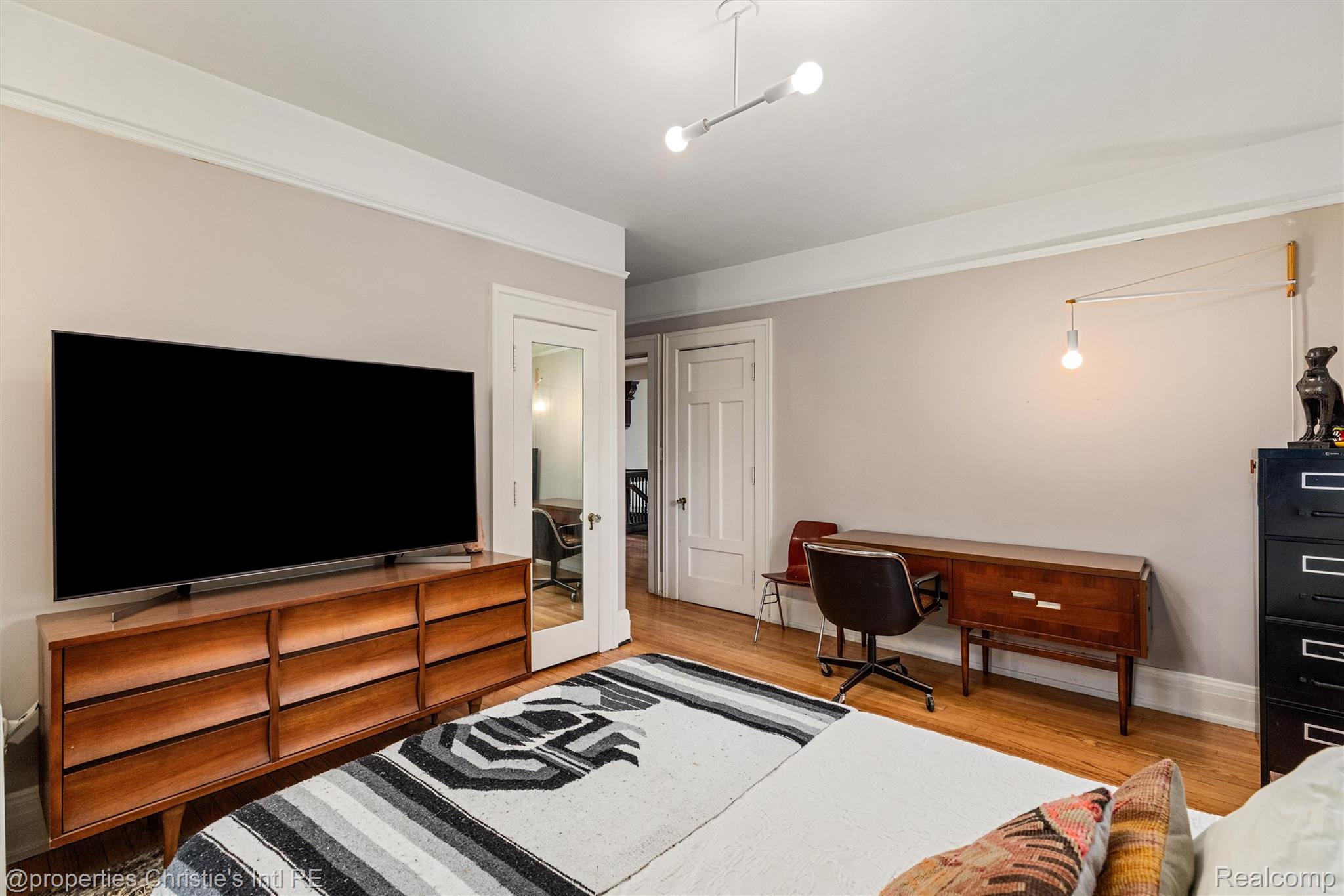 36 Longfellow Street Detroit, MI 48202 - Photo 39 of 81 Bedroom featuring light wood-type flooring and baseboards
