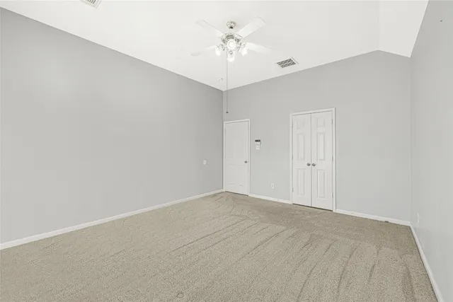 a bathroom with a bathtub sink and mirror