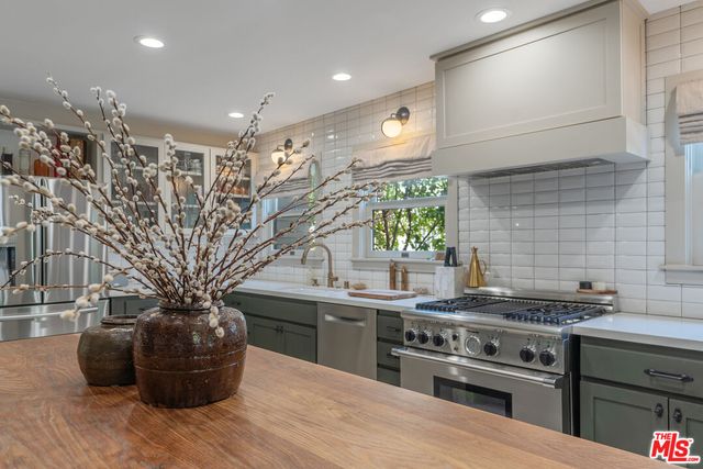a view of a wooden door and outdoor space