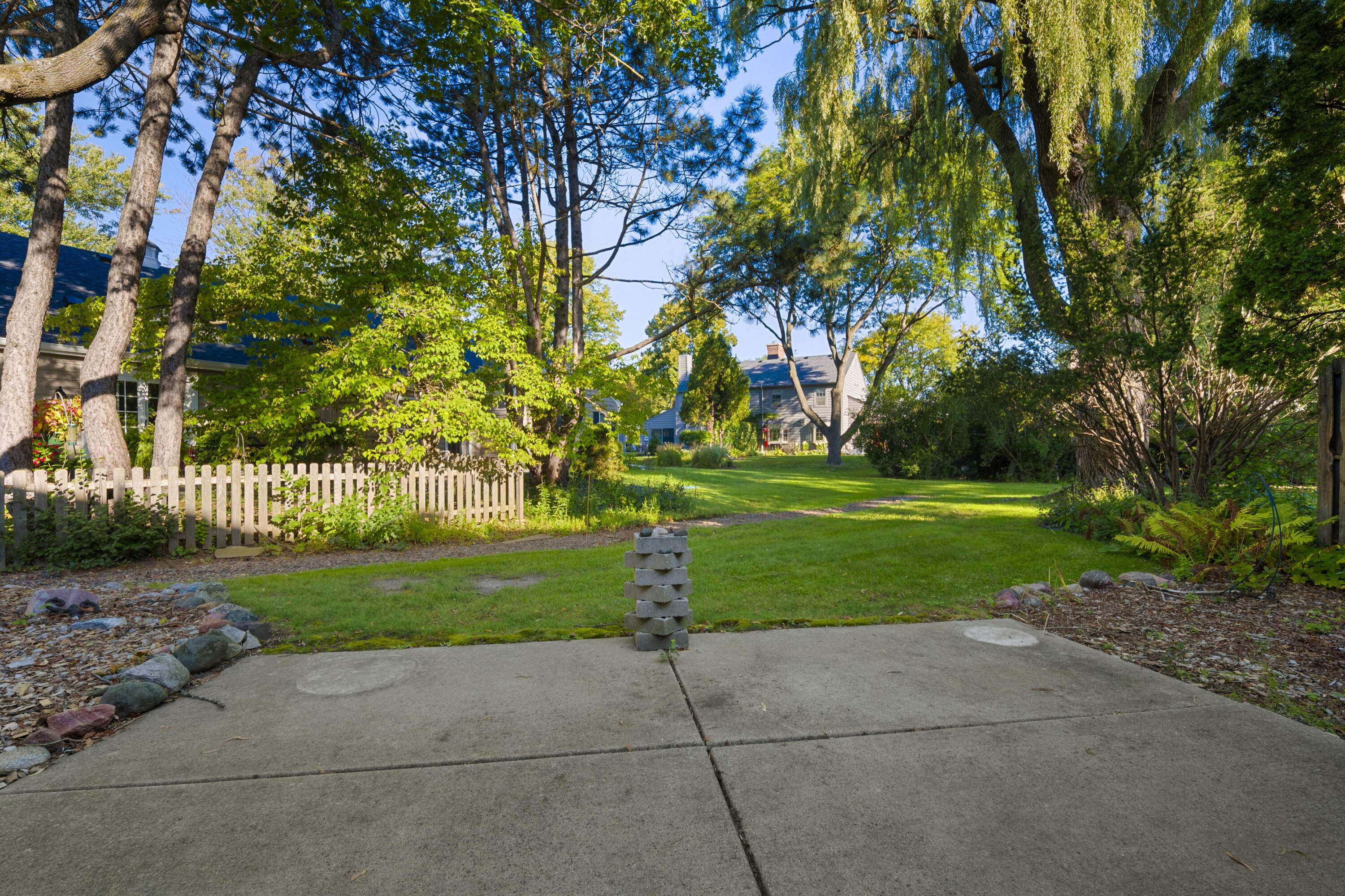1012 West Cedar Ridge Court Mequon, WI 53092 - Photo 28 of 36 Lush backyard.