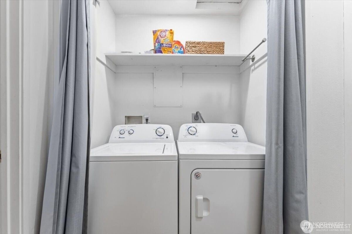 380 North Shore Court Manson, WA 98831 - Photo 15 of 27 a utility room with dryer and washer
