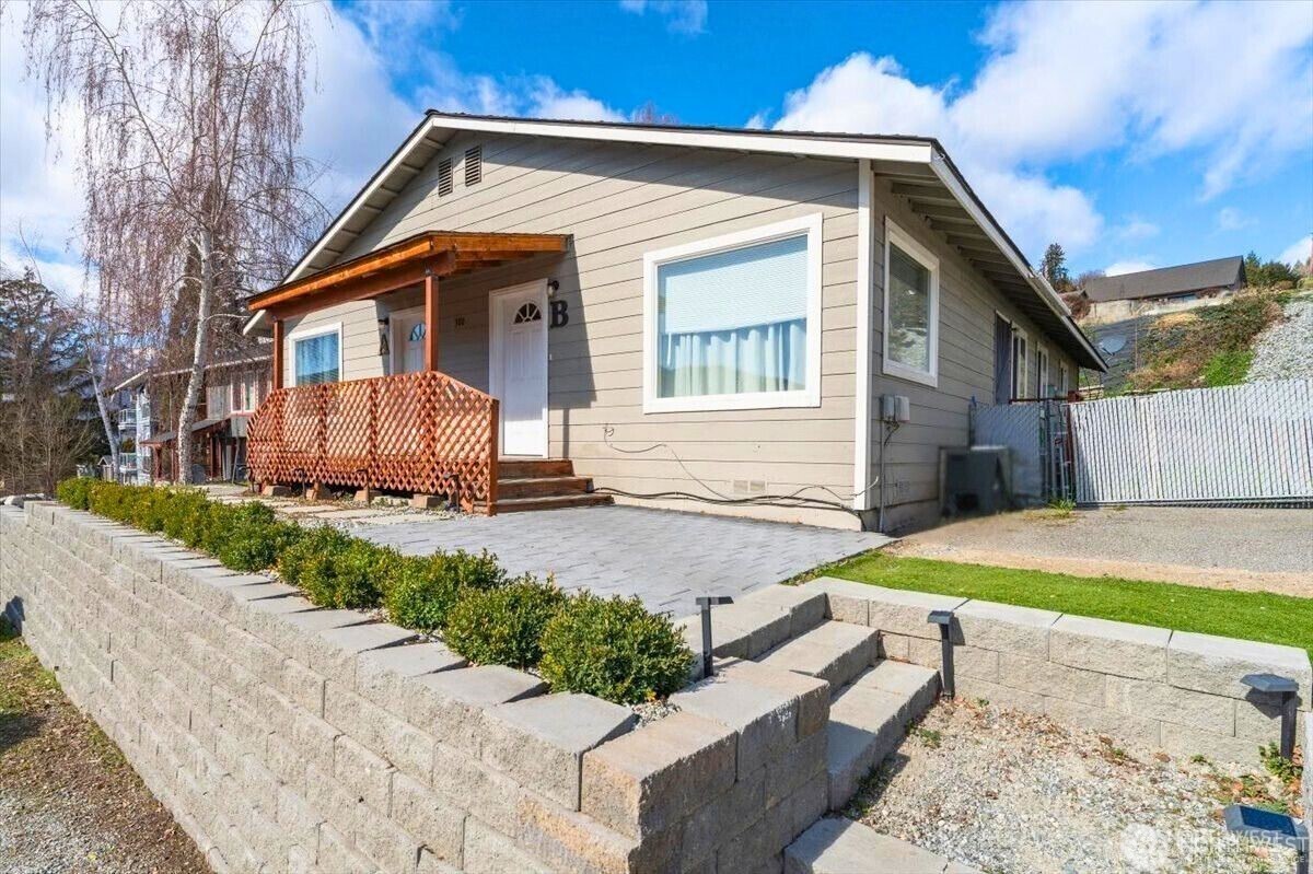 380 North Shore Court Manson, WA 98831 - Photo 27 of 27 a front view of a house with a yard