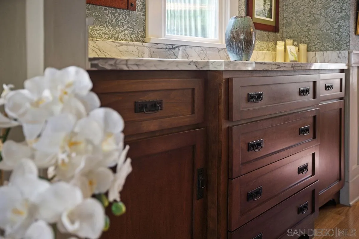 3636 Herbert Street San Diego, CA 92103 - Photo 15 of 55 a bathroom with a sink and vanity