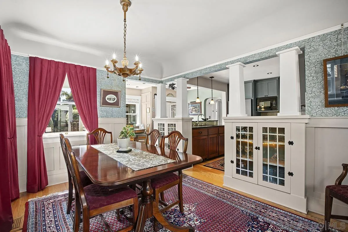 3636 Herbert Street San Diego, CA 92103 - Photo 16 of 55 a view of a dining room with furniture window and wooden floor