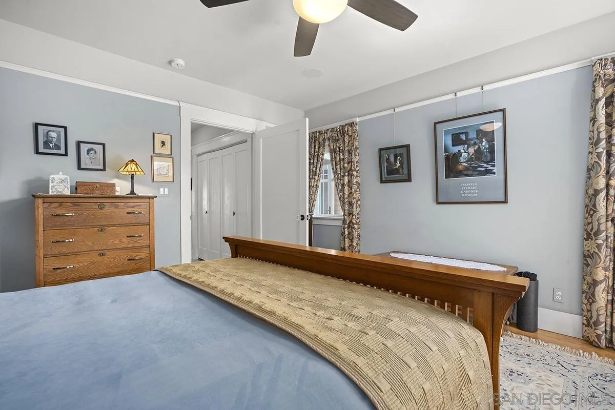 3636 Herbert Street San Diego, CA 92103 - Photo 32 of 55 a bedroom with a bed and a dresser