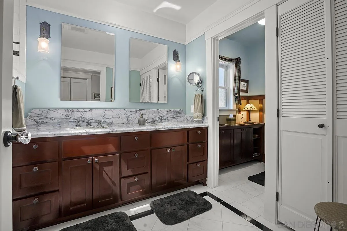 3636 Herbert Street San Diego, CA 92103 - Photo 33 of 55 a bathroom with a sink and a mirror