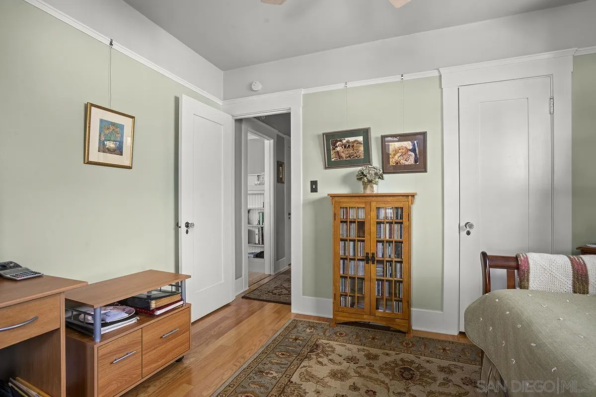 3636 Herbert Street San Diego, CA 92103 - Photo 39 of 55 a bedroom with a bed and hallway