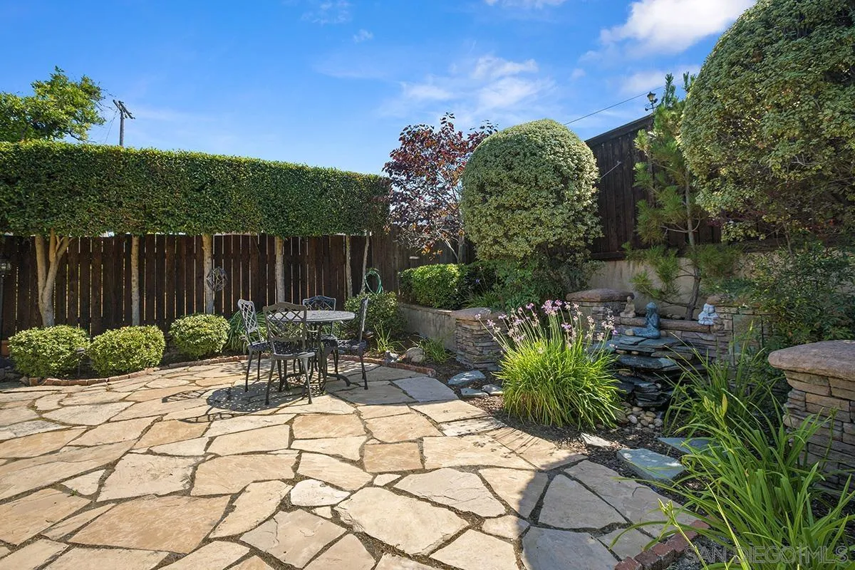3636 Herbert Street San Diego, CA 92103 - Photo 50 of 55 a view of a chair and table in the backyard