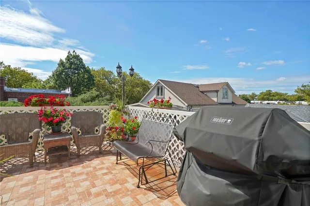 a view of a terrace with sitting area