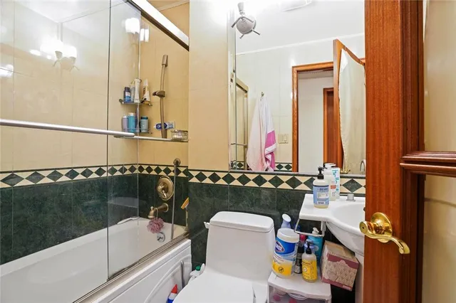 a bathroom with a sink and a bathtub