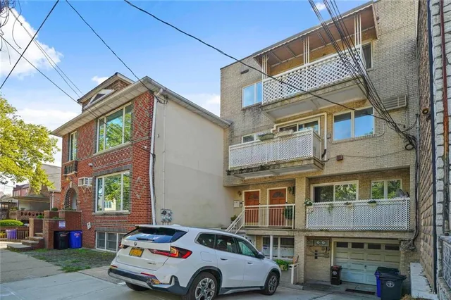 a car parked in front of a building