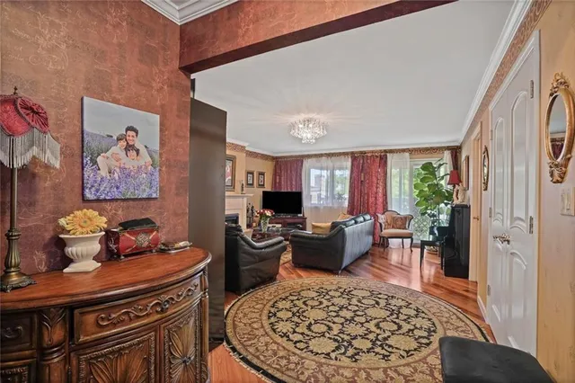 a living room with furniture and a rug