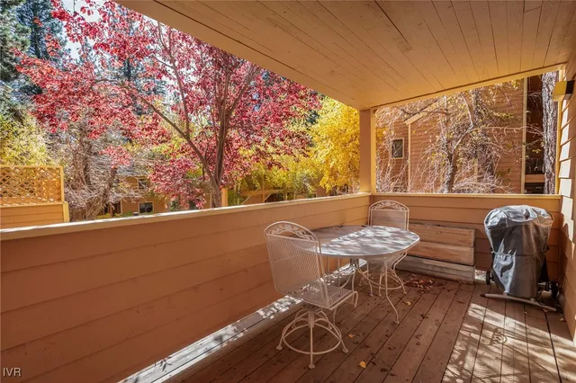 a view of a patio with chair and table