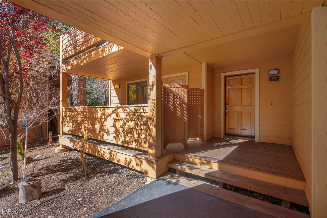 939 Incline Way, Unit 221 Incline Village, NV 89451 - Photo 6 of 20 a view of a house with a wooden bench