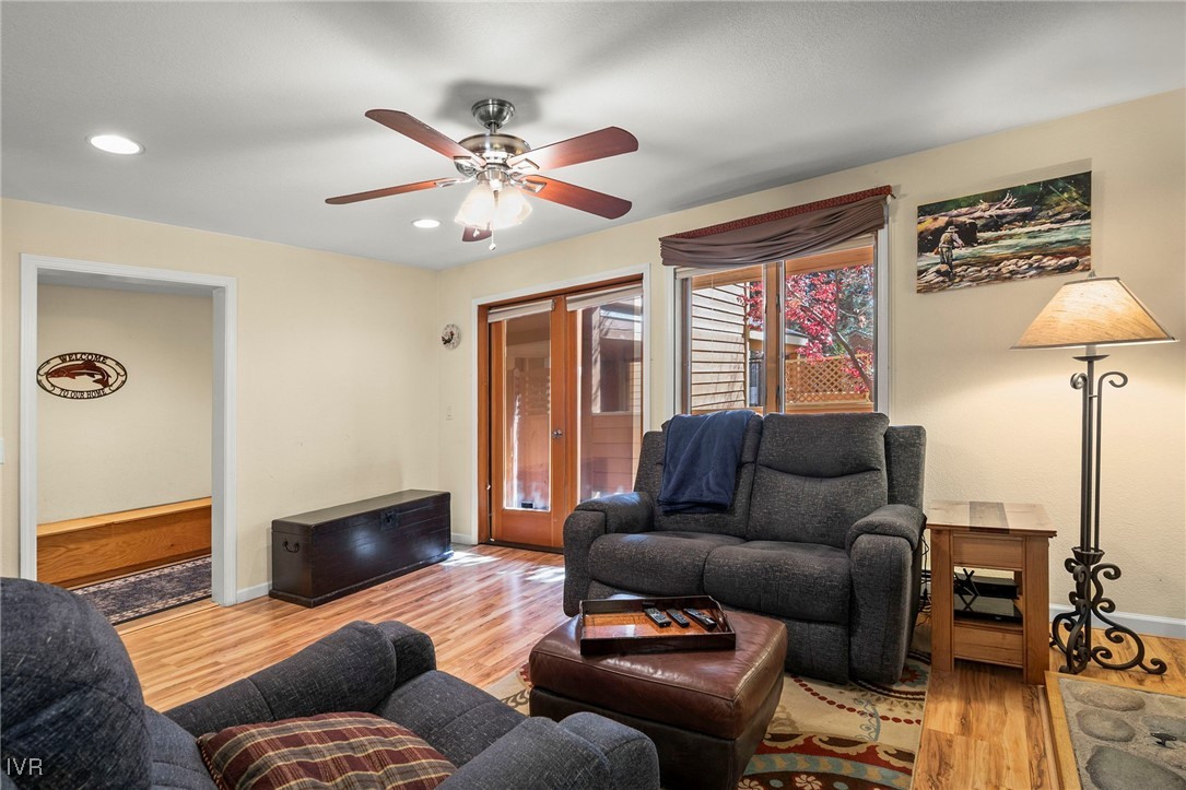 939 Incline Way, Unit 221 Incline Village, NV 89451 - Photo 9 of 20 a living room with furniture and a flat screen tv