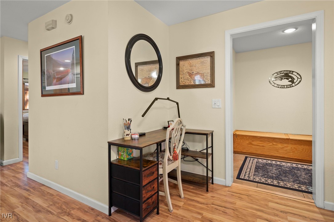 939 Incline Way, Unit 221 Incline Village, NV 89451 - Photo 10 of 20 a view of a livingroom with furniture and wooden floor