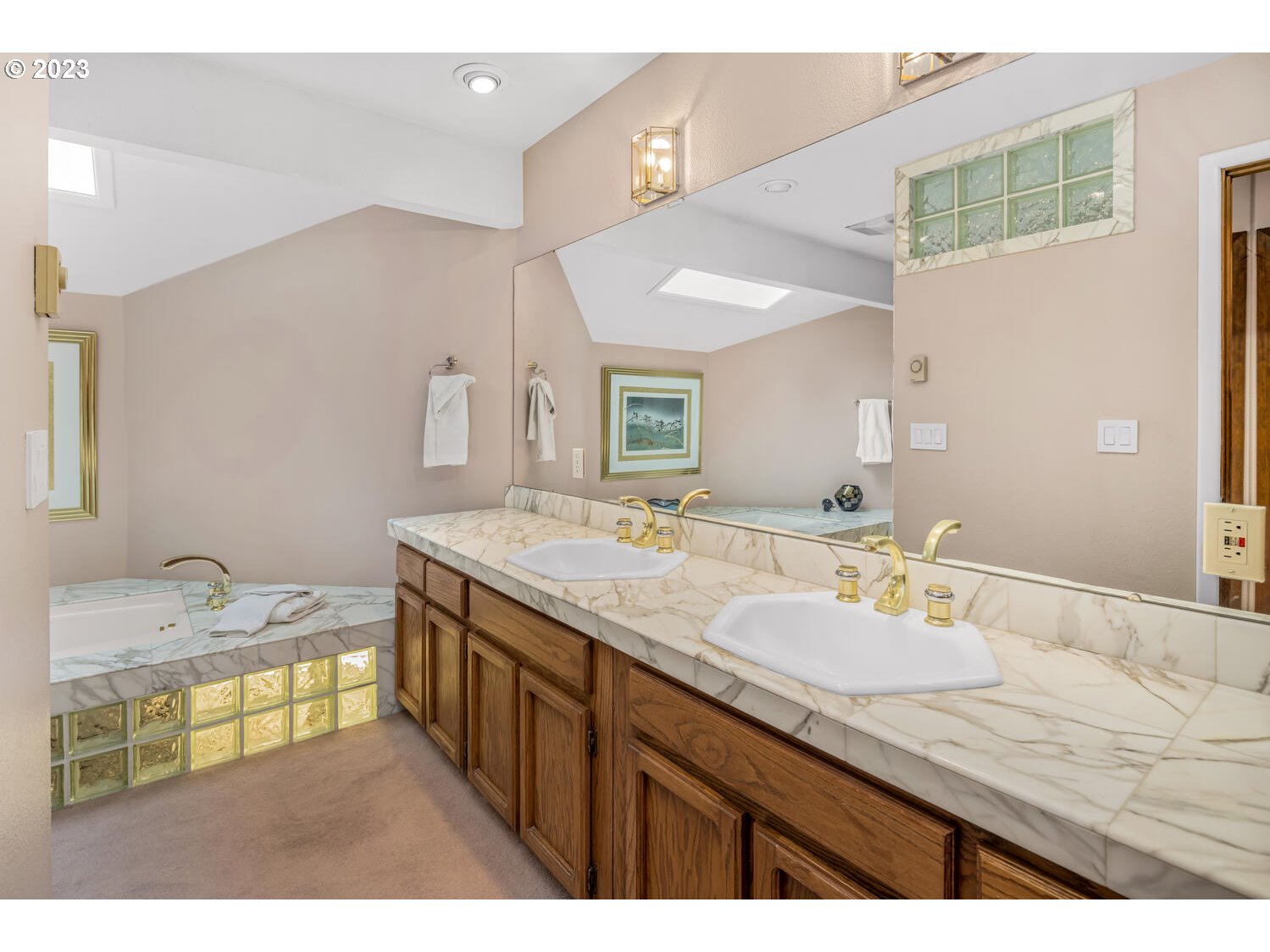 822 Southeast Morgan Road Vancouver, WA 98664 - Photo 14 of 32 a bathroom with a granite countertop sink a large mirror and a