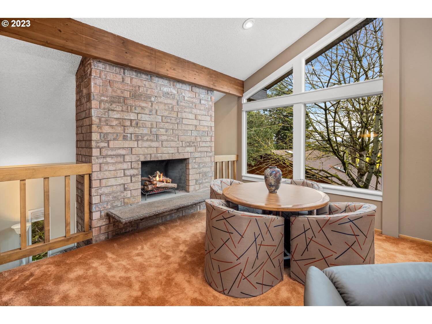 822 Southeast Morgan Road Vancouver, WA 98664 - Photo 19 of 32 a living room with furniture a fireplace and a large window