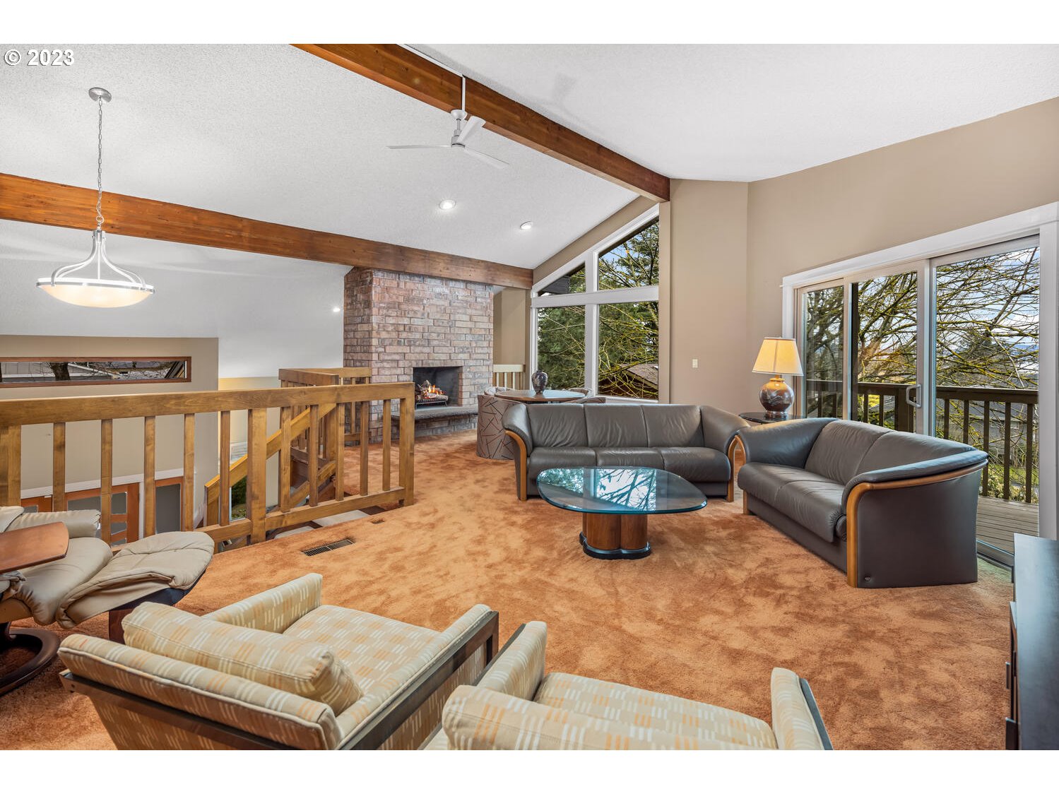 822 Southeast Morgan Road Vancouver, WA 98664 - Photo 20 of 32 a living room with furniture a rug potted plant and a large window