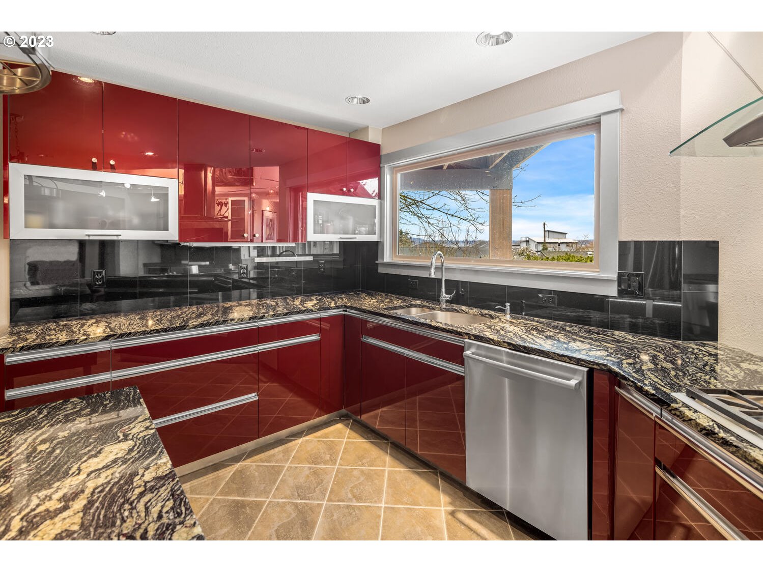 822 Southeast Morgan Road Vancouver, WA 98664 - Photo 10 of 32 a kitchen with stainless steel appliances granite countertop a stove sink and cabinets