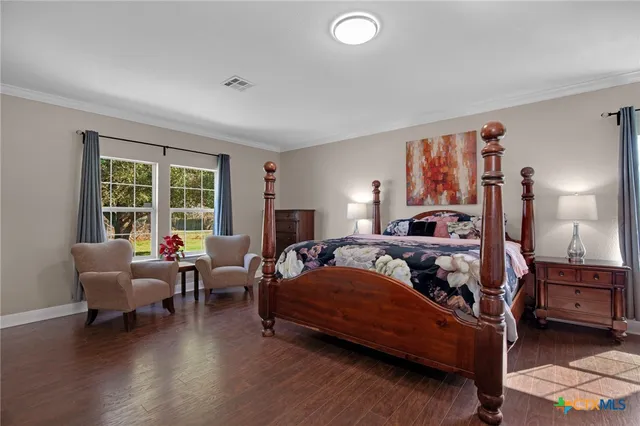 a bed room with a bed and a couch