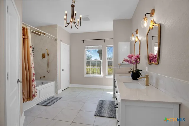 a bathroom with a toilet sink and shower