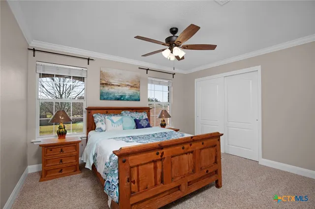 a bathroom with a sink and mirror with toilet