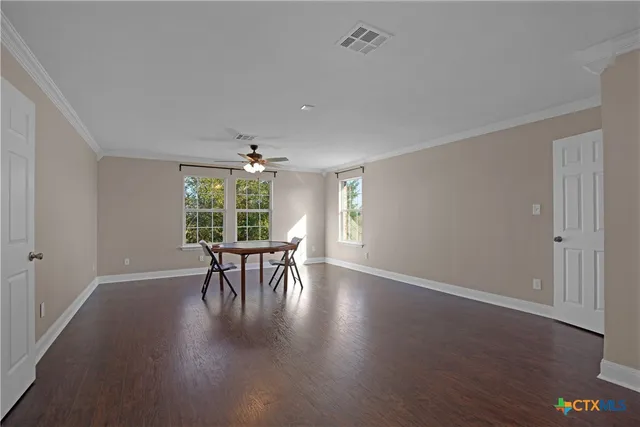 a workspace with furniture and window