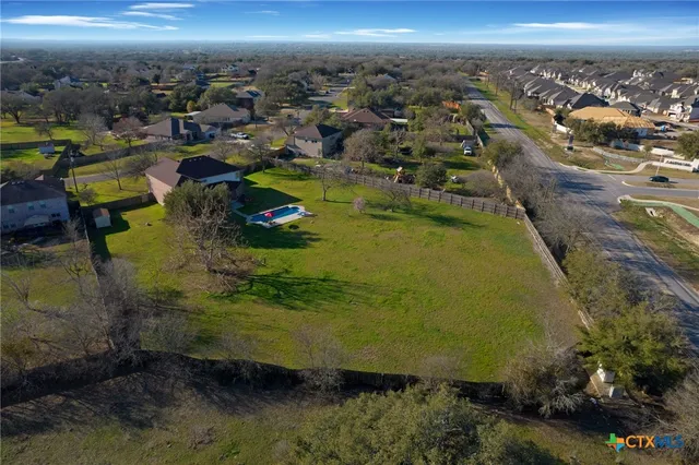 a living room with furniture rug and window