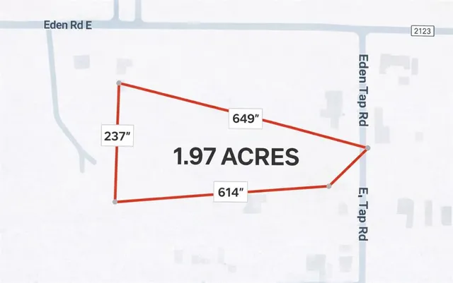 a view of a hallway with a white house and a white bed