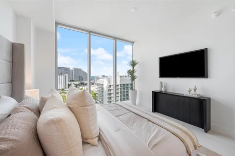 a utility room with sink dryer and washer