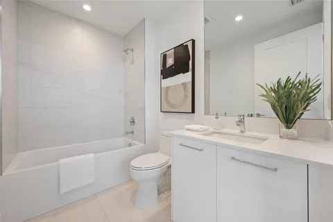 a view of a hallway with white walls