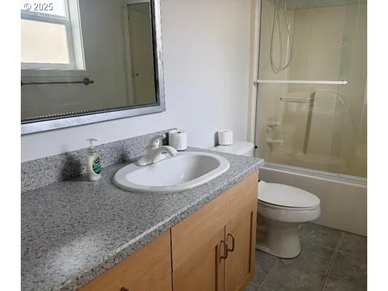 a bathroom with a sink and a toilet