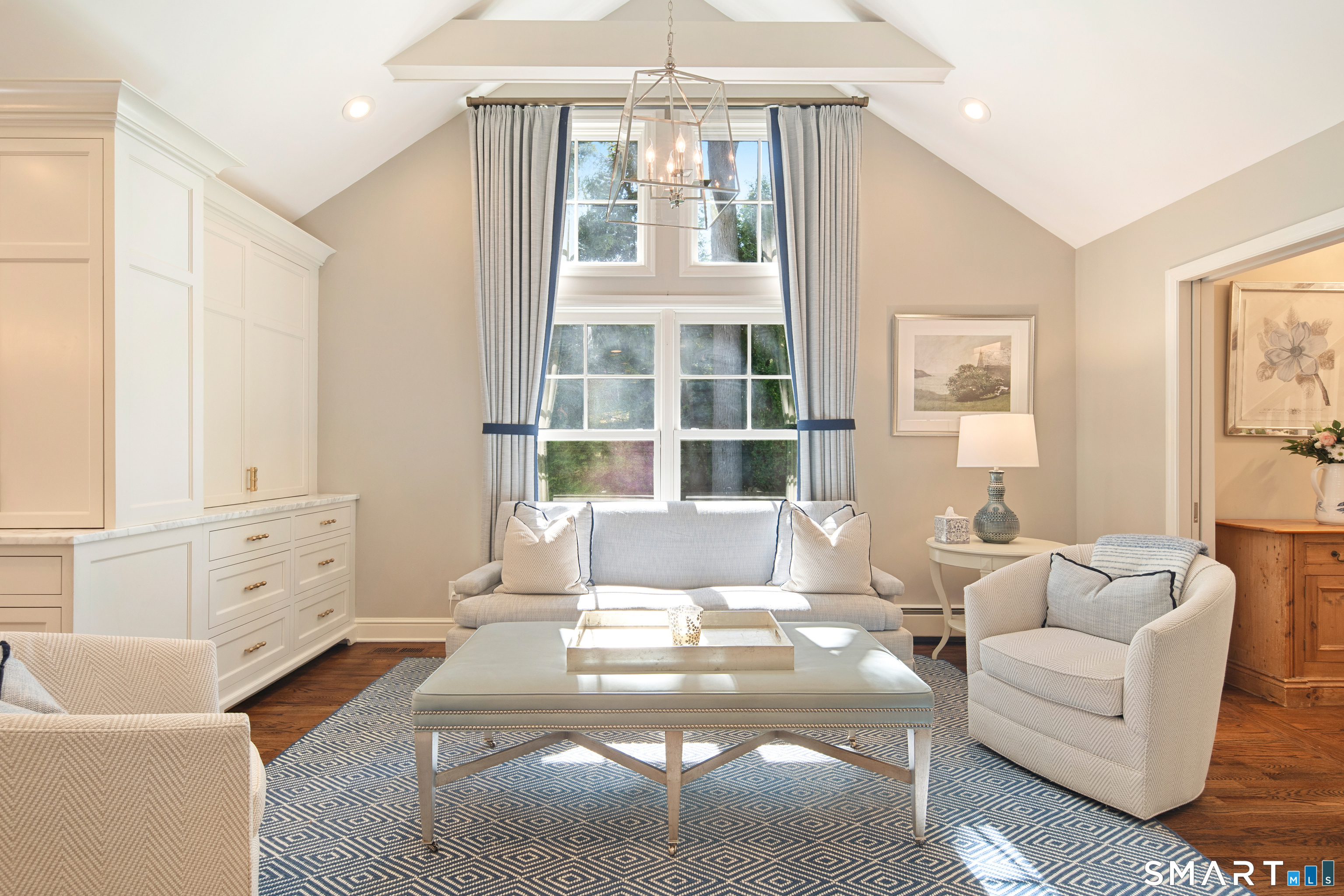 11 McLaren Road South Darien, CT 06820 - Photo 33 of 40 a living room with furniture and a large window