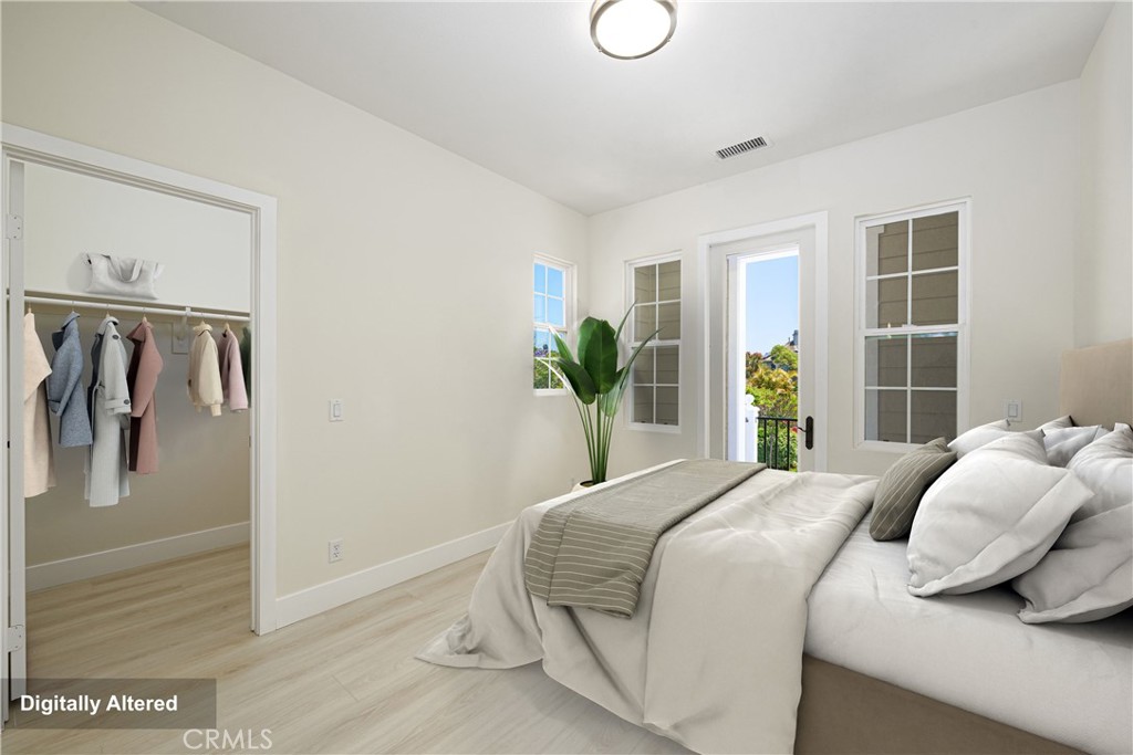 15 Plum Street Ladera Ranch, CA 92694 - Photo 45 of 113 a bedroom with a bed next to a window