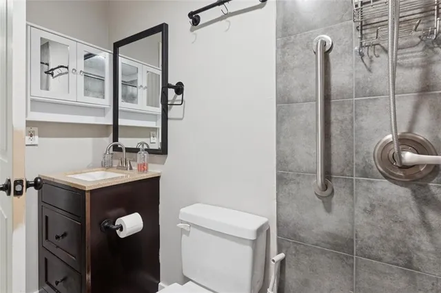 a view of livingroom with hardwood floor and ceiling fan