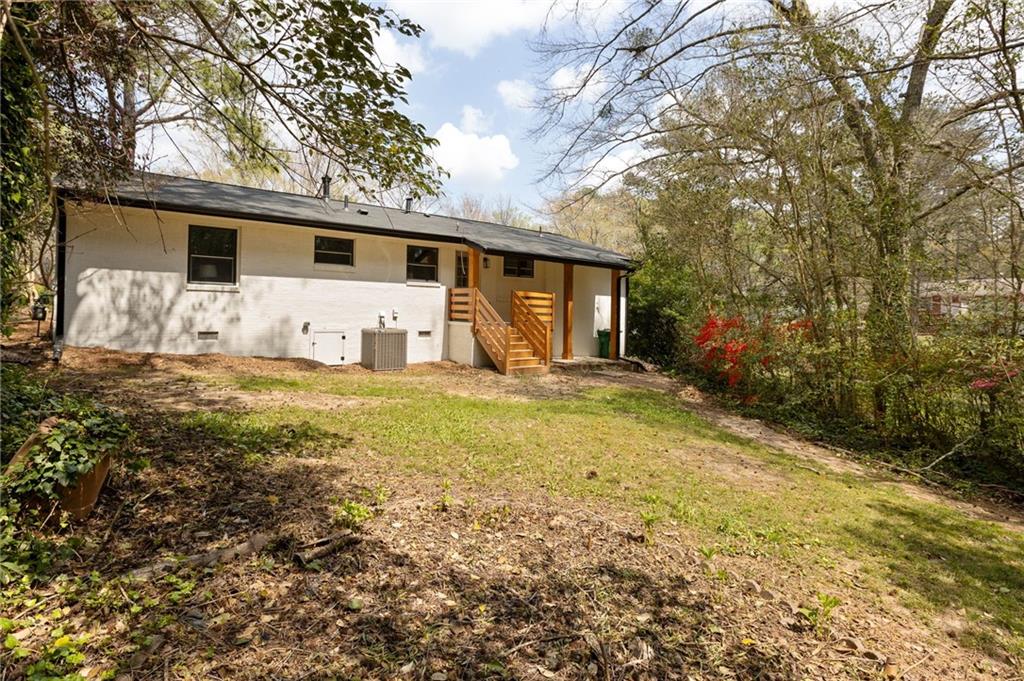 2633 Yale Terrace Decatur, GA 30032 - Photo 19 of 21 a front view of house with yard and trees around