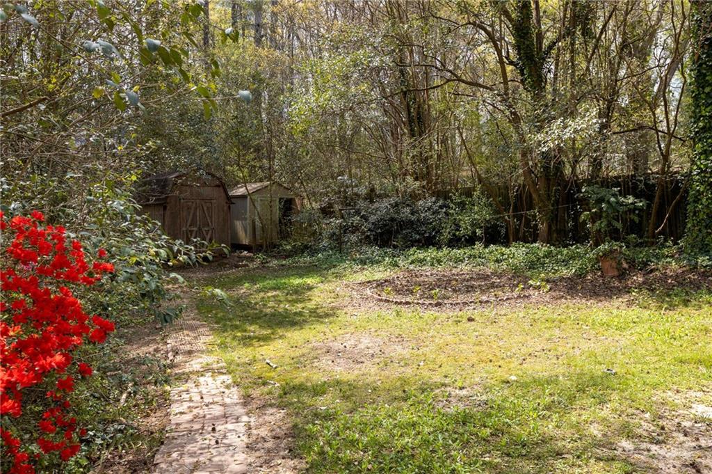 2633 Yale Terrace Decatur, GA 30032 - Photo 20 of 21 a view of a swimming pool with a garden