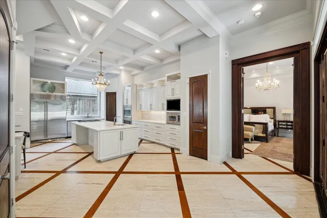 a view of walk in closet with clothes