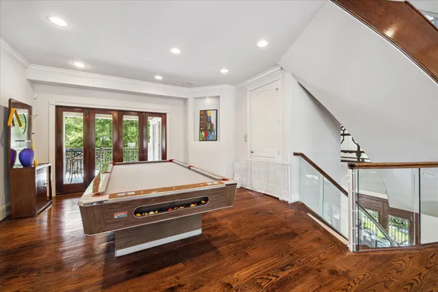 a kitchen with stainless steel appliances and white cabinets