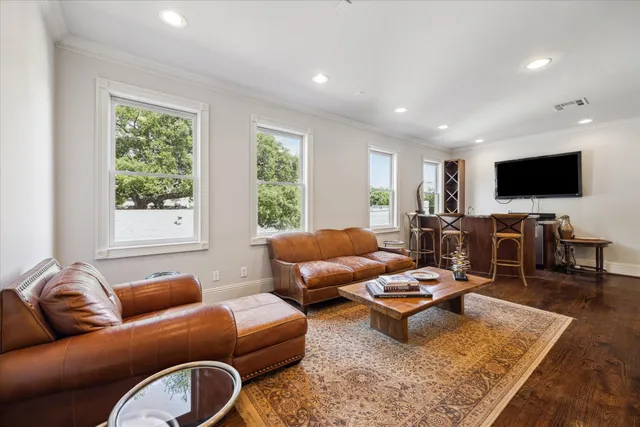a view of room with window and ceiling fan