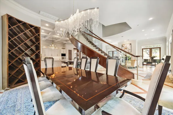 a view of a chairs and table in the balcony