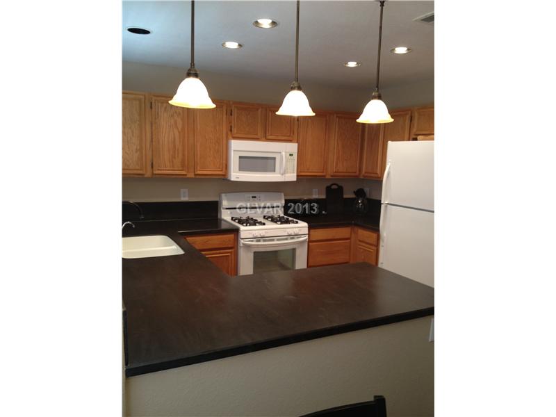 8708 Magnolia Ridge Avenue Las Vegas, NV 89134 - Photo 12 of 24 Kitchen.
