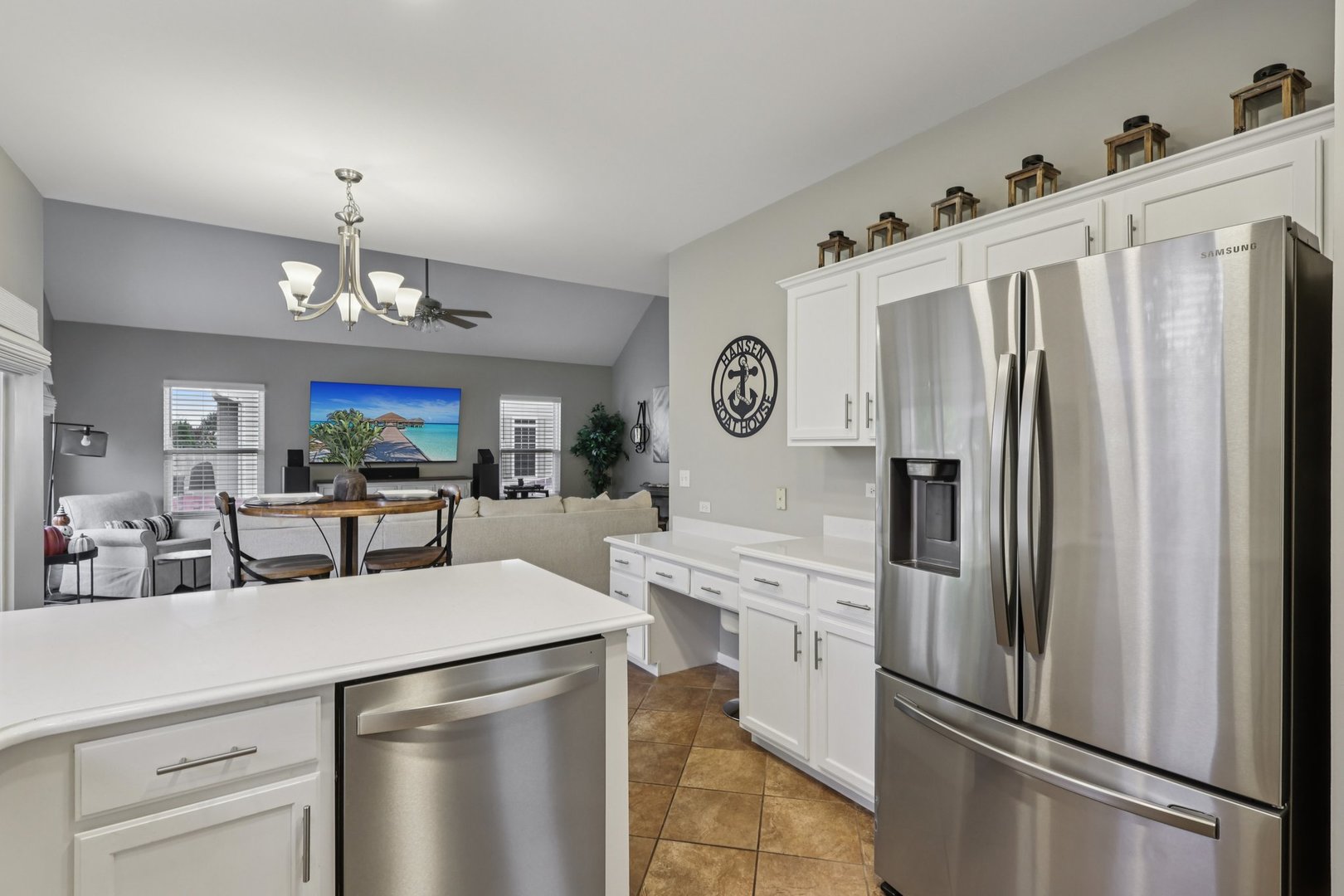 11680 Cape Cod Lane Huntley, IL 60142 - Photo 15 of 47 a kitchen with stainless steel appliances a refrigerator sink and cabinets